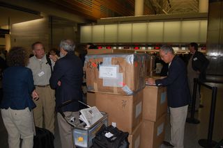 Volunteers and boxes leaving SFO