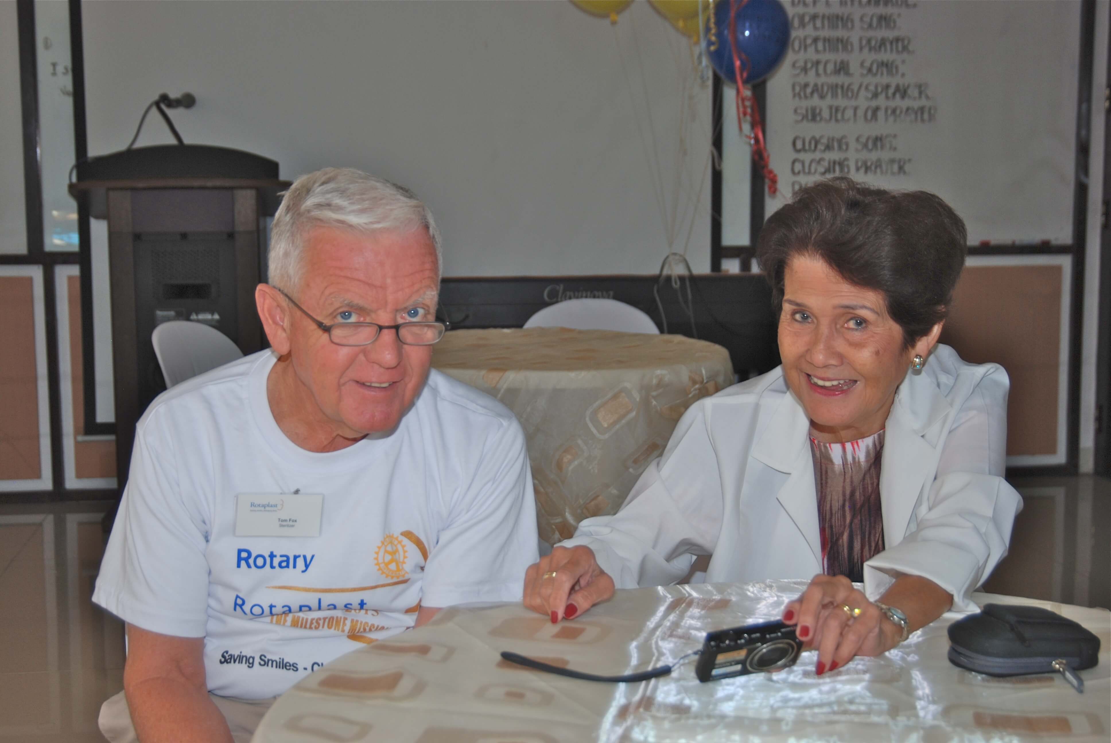 Quatermaster/ Sterilizer- Tom Fox share a moment with Mission Director Evelyn Abad, RN